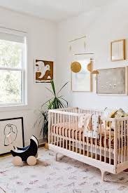 Neutral eclectic nursery interior design idea. An Organic Modern Gender Neutral Nursery Reveal Paper And Stitch Nursery Makeover Baby Room Decor Kid Room Decor
