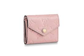 The perforated monogram design in grey adds an elegant contrast against the bois de rose pink shade of the bag. Louis Vuitton Monogram Wallets Available Now Hypebae