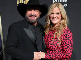 Garth Brooks' wife Trisha Yearwood displays incredible slimmed-down  physique in mini dress and fishnet tights – wow | HELLO!