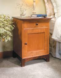 This mid century modern nightstand features hard wood construction, original walnut finish, two dovetailed drawers with brass accented hardware, and tapered legs. Two Tone Night Stand Woodworking Project Woodsmith Plans
