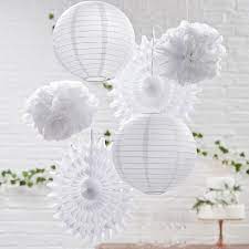 A bright wedding backdrop of colorful ribbons and colorful honeycomb pompoms. White Party And Wedding Paper Hanging Decorations By Ginger Ray Notonthehighstreet Com