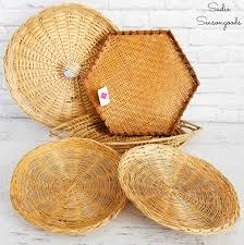 Teeming with texture, this basket is handwoven from rattan in a warm honey brown hue for a natural and classic look. Basket Wall Decor With Bohemian Design From The Thrift Store