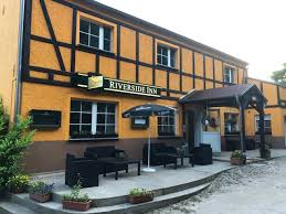 Supper club doing what we love since 1978 food.drink.bocce.river tubing. Bett Bike Riverside Inn Unterkunft