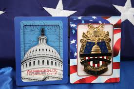 After hitting the barricade, the driver exited the car with a knife in hand and lunged at. Image Of A United States Commemorative Capitol Police Badge And A Triangular Folded U S Flag Close Up View Of Badge The Portal To Texas History