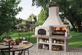 Hochwertige und bezahlbare, lizenzfreie sowie lizenzpflichtige bilder. Grillkamin Mit Pizzaofen Fur Den Garten