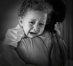 A SILENT CRY Amidst the lines of a child's lullaby, there lies, within,  such a silent cry. Tears of pain have taken their toll, behind the mask of  a sobbing soul. So