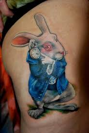 The white rabbit is a fictional character in lewis carroll's 1865 book alice's adventures in wonderland.he appears at the very beginning of the book, in chapter one, wearing a waistcoat, and muttering oh dear!oh dear! White Rabbit Tattoo White Rabbit Tattoo Rabbit Tattoos Epic Tattoo