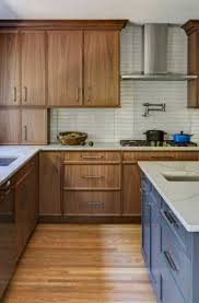The best way to update those walnut stain cabinets, in my opinion, is to paint the walls white or a slight i thought long and hard on what color to pick for my client and finally settled on mindful gray. 17 Walnut Kitchen Cabinet Ideas Sebring Design Build