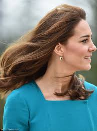 Kate Middleton wears Emilia Wickstead dress and Reiss coat at Action