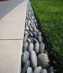 Maybe you would like to learn more about one of these? Garden Ideas Beach Stone Garden Edging Compliments Your Landscaping Features Perfectly Click Pic Fo River Rock Landscaping Landscape Edging Garden Edging