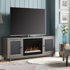 A single, adjustable shelf is concealed. Jesse Electric Fireplace Media Console By Dimplex W Crystals