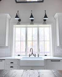 Elements Of A Great Modern Country Kitchen Decorated Life Modern Country Kitchens Neutral Kitchen Designs Kitchen Sink Lighting