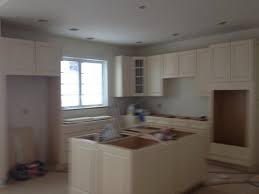 In this space designed by the brooklyn home company, the walls, cabinets, and vent hood are all covered in the cool hue. Help My New Antique White Kitchen Cabinets Look Yellow