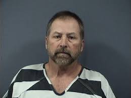 Convicted murderer charged in fatal crash