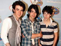 On sunday night, kevin, joe, and nick attended their first public event together in over a year as they stepped out for the billboard music awards. Then And Now The Jonas Brothers Style Evolution 2006 2020