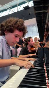 9 year old kid plays Vivaldi with us and shocks the entire airport … 🤯 # vivaldi #violin #piano