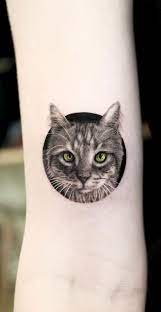 These Awesome Cat Tattoos Will Take Your Cat Obsession To The Next Level Kickass Things Cat Tattoo Cat Eyes Tattoo Grey Cat Tattoo