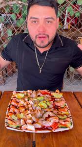 Disfrutando del Platón de Mariscos en La Rosita