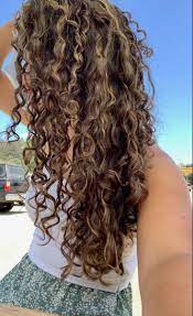 Bangs with curly hair look good on a curly long bob (lob). Curly Hair Highlights Curly Hair Natural Curls Hairstyles Dyed Curly Hair