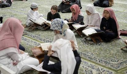 تعليم القرآن والعربية للمسلمين الجدد