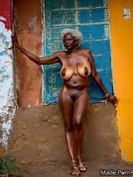Porn image of photo nude 80 skinny african white hair seductive wild afro  created by AI