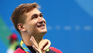 U.S. swimmer Nathan Adrian stays true to his roots