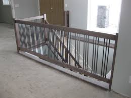 We supply an extensive range of wrought iron stair spindles to the public and commercial businesses. New Construction Contemporary Maple Railings With Metal Spindles Contemporary Staircase Other By Woodland Stair Works Houzz Uk