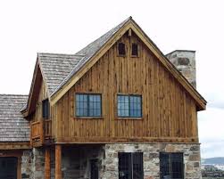 Cedar board and batten exterior. Rustic Board And Batten Siding With Stone Novocom Top