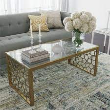 Compact living room featuring large white fireplace, tan rug, and glass coffee. Glass Gold Coffee Tables You Ll Love In 2021 Wayfair