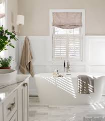 The design originated from the 20 th century, focusing on the imaginations about the future. Gray Bathroom By Erin Paige Pitts Neutral Bathroom Decor