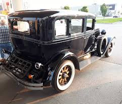 Image result for Scaraba Green 1930 Oldsmobile