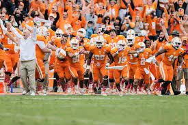 The Tennessee Volunteers Running Onto The Field After The Game Winning Kick Against South Carolina Tennessee Volunteers Football Tennessee Volunteers Tennessee