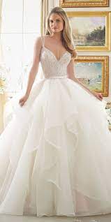 We did not find results for: Schillerndes Perlen Oberteil Auf Brautkleid Aus Volants Aus Tull Und Organza Angela Becker Blog