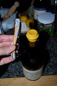 A key, wire hanger, a serrated knife or even a pair of scissors. Wine Bottle Wax Capsules How Do You Open Them Easily