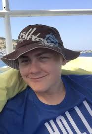 Biker, 17, thrown under moving bus after swerving to avoid opening car door 