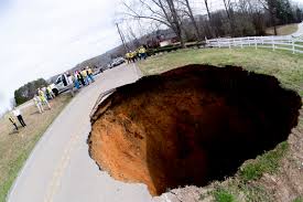 monster' sinkhole caged, but could cost
