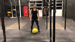 Pick a wod then tag a friend. How To Do A D Ball Over The Shoulder Popsugar Fitness