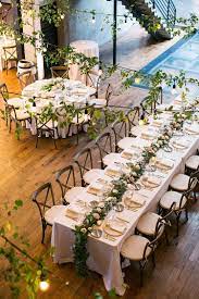 A Sarah Seven Bride For A Rooftop Jewish Wedding At Fremont Foundry Seattle Washington Usa Smashing The Glass Jewish Wedding Blog Jewish Wedding Fremont Foundry Flower Centerpieces Wedding