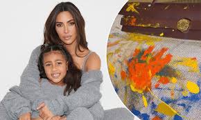 How many kids does kim kardashian have? Kim Kardashian Proudly Displays Hermes Bag Daughter North Painted As A Baby Daily Mail Online