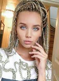 Photo about a beautiful african woman with traditional clothing dancing in front of a group outdoors on the street. 8 Beautiful White Women In African Braids Afroculture Net