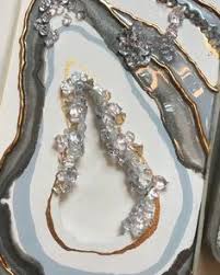 Despite its ubiquity, the origins of the dollar sign remain far from clear, with competing theories touching on bohemian coins, the pillars of hercules and harried merchants. Shahnaz Bhatia Bhatia0398 Profile Pinterest