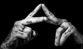 A sword wrapped with text banners saying 'live' 'laugh' you often find the sword in intricate tattoos showing the different sides of love. Live By The Sword Tattoo Williamsburg Brooklyn