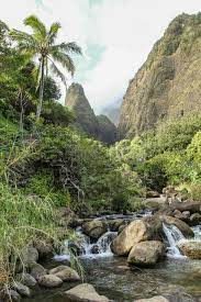 Towering emerald peaks guard the lush valley floor of iao valley state park. Iao Valley State Park In Wailuku Needle Lookout Trail