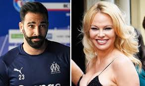 As for adil rami's international career, rami first debuted in a friendly match against norway on 11th august the main source of adil rami's earning is through his club's contract, national team salary. Pamela Anderson Boyfriend Who Is Adil Rami Why Have They Split Up Football Sport Express Co Uk