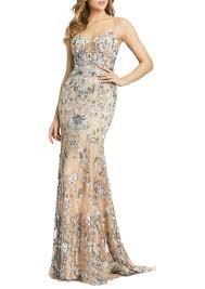 Irresistibly sewn with beaded floral embroidery on an illusion bodice, this piece flatters with an illusion jewel neckline trimmed with jewels. Mac Duggal Mac Duggal Floral Embroidered Trumpet Gown Dresses