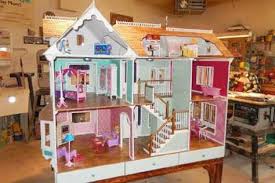 Download A Set Of Free Doll House Plans With Photos And Step By Step Instructions This Unique Design Folds Doll House Plans Barbie Doll House Diy Barbie House