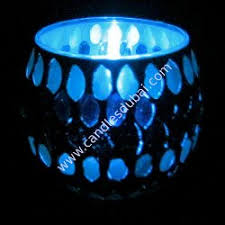Closeup red candles in clear glass lit on the candle holder at temple, candlelight. Votives In Dubai Candlesdubai Votive Candles Votives In Decorated Votive Holder Scented Votive Candles Colored Votives Candles Hotel Restaurant Spa Votive Candles