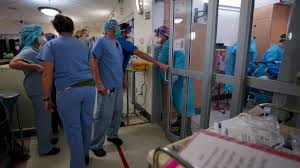 San Diego reporter Paul Sisson interviews front-line health care workers as  COVID-19 pandemic fills local hospitals