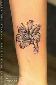 An attractive flower tattoo that you simply may wish to contemplate is the lily tattoo. Lily Tattoo Best Tattoo Studio In India Black Poison Tattoos