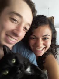 Kitty living happy life with pheasant feathers